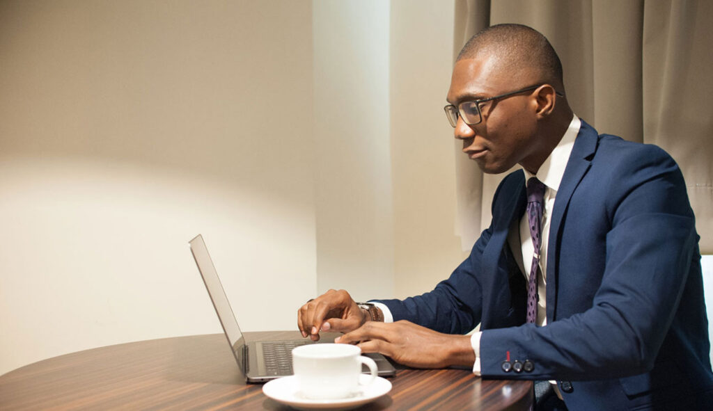 Businessman Using Laptop